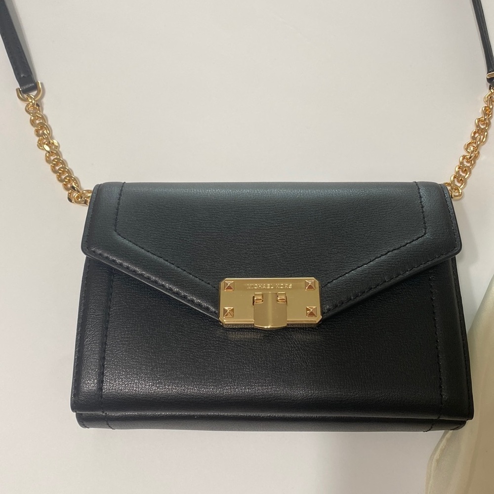 Brand new, never used Michael Kors crossbody wallet/purse combo